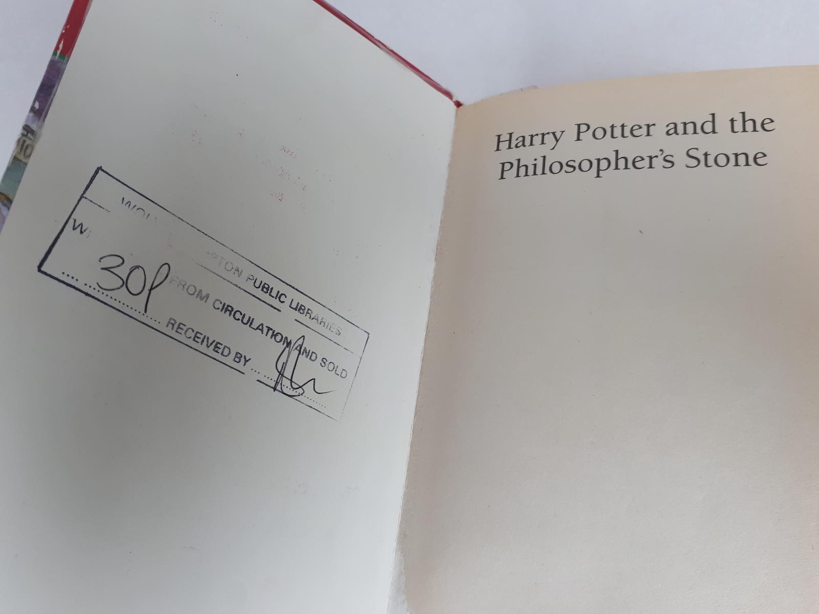 The withdrawn stamp inside the book