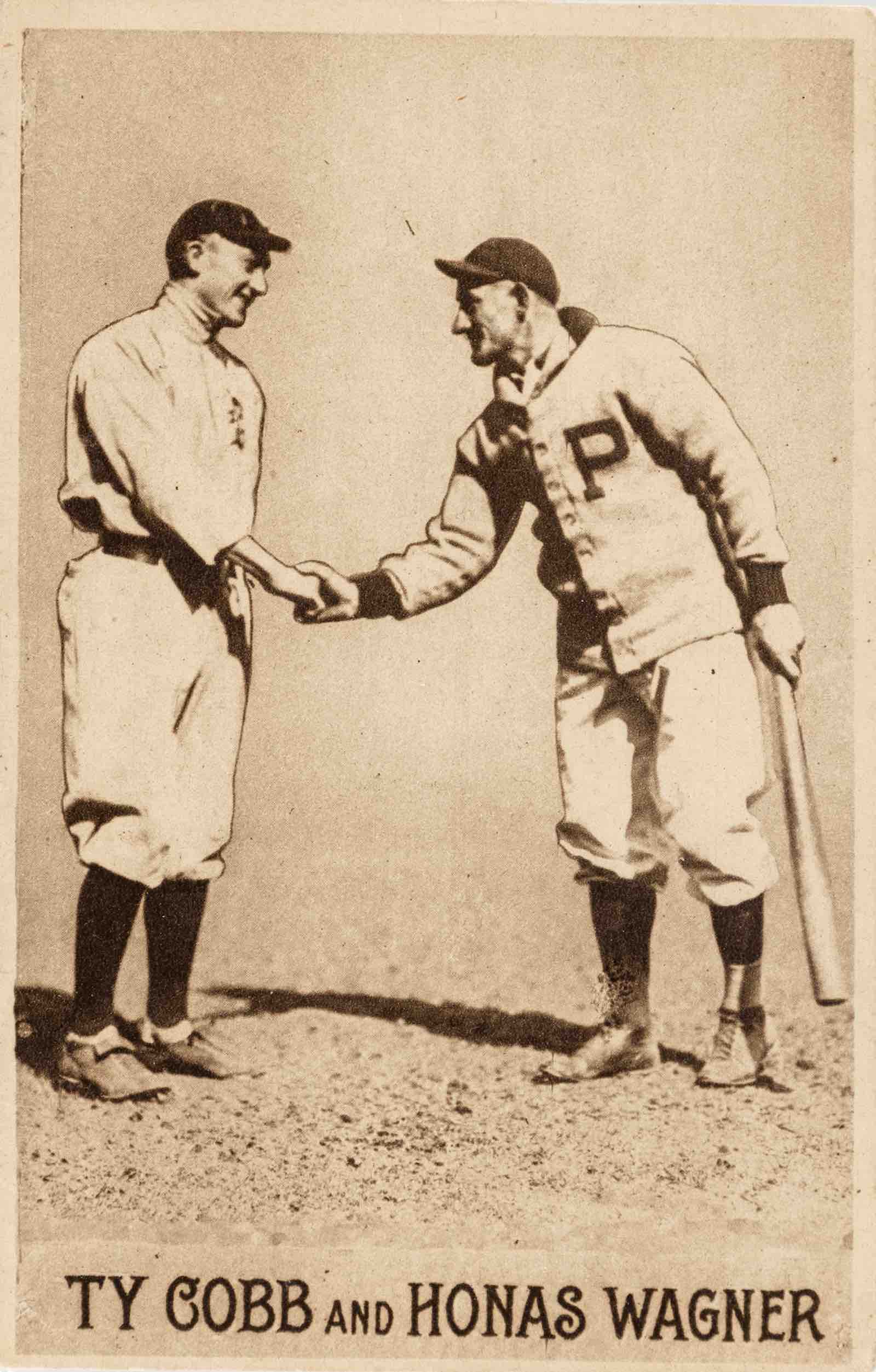 1910 postcard from the sought-after ‘PC796 Sepia Postcards’ series. Depicts Ty Cobb  shaking hands with Honus Wagner at the 1909 World Series