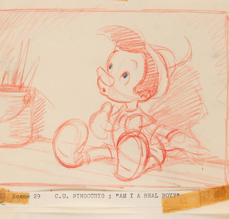 Sketch of Disney's Pinocchio in red, mounted with tape to a sketchbook page.